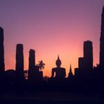 Majestic sunset sky over Big Buddha statue